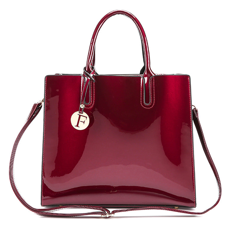 Artificial Patent Leather Glossy handbag Luvéillé
