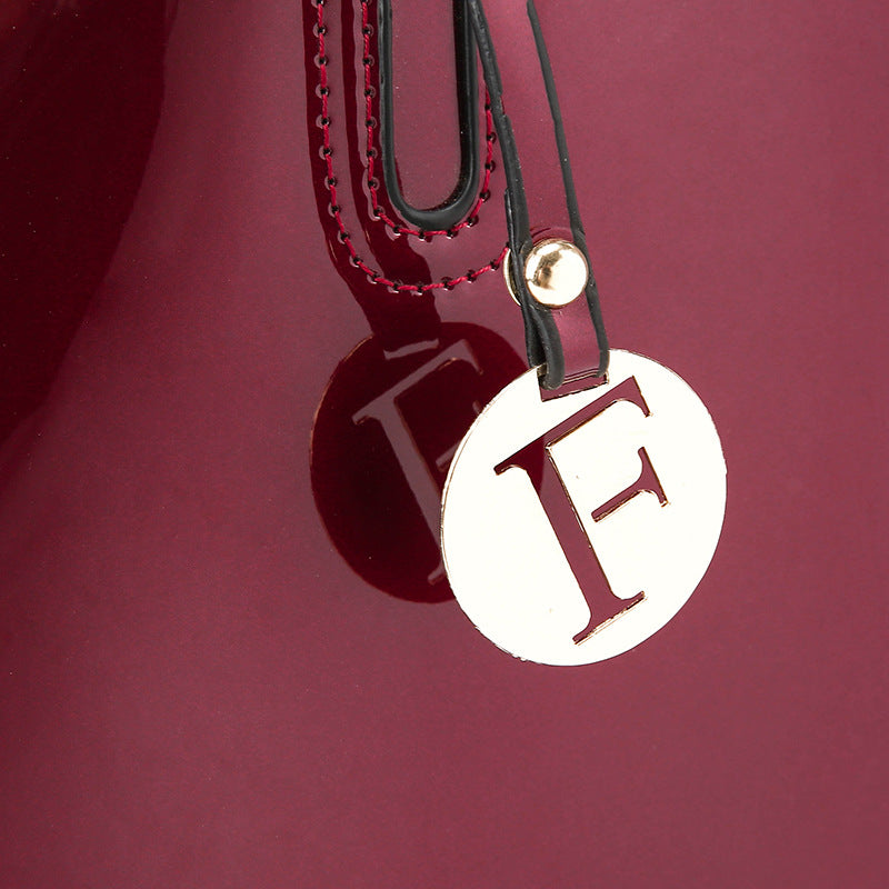 Artificial Patent Leather Glossy handbag Luvéillé