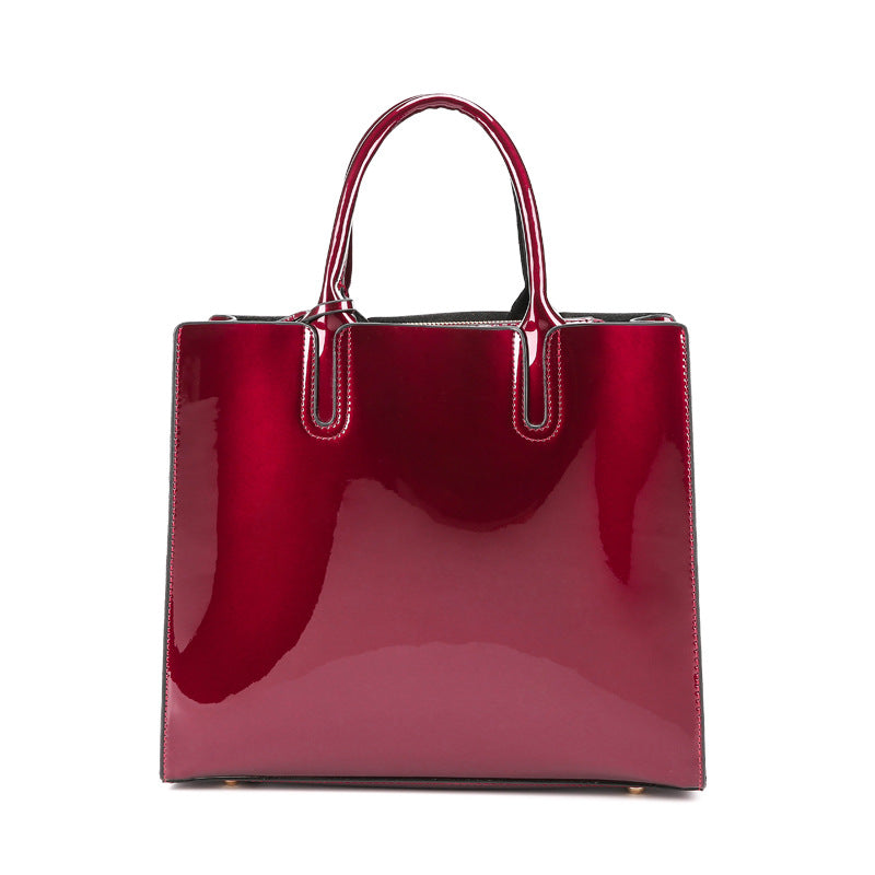 Artificial Patent Leather Glossy handbag Luvéillé