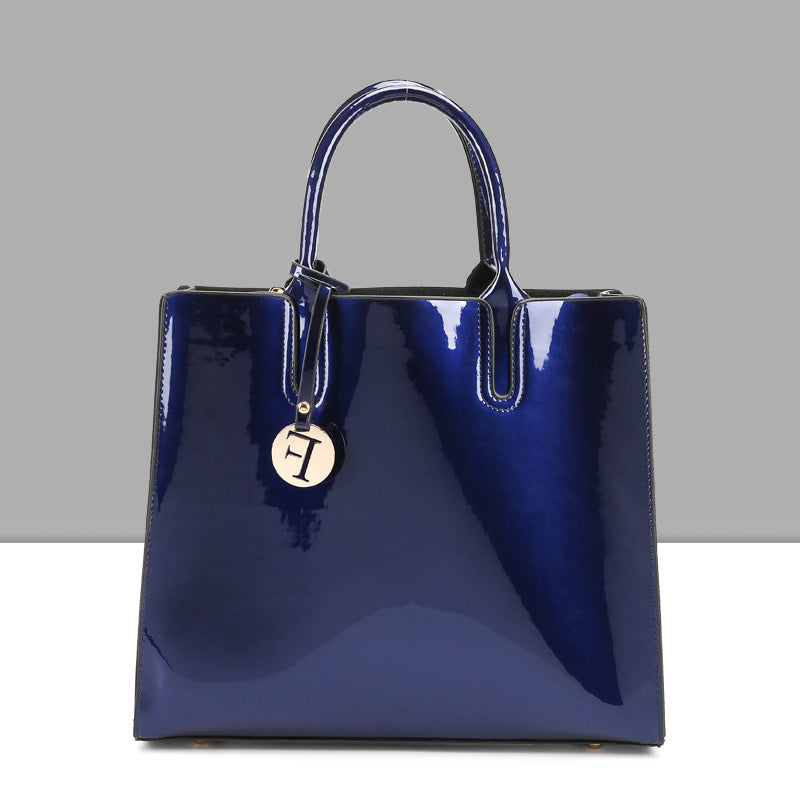 Artificial Patent Leather Glossy handbag Luvéillé
