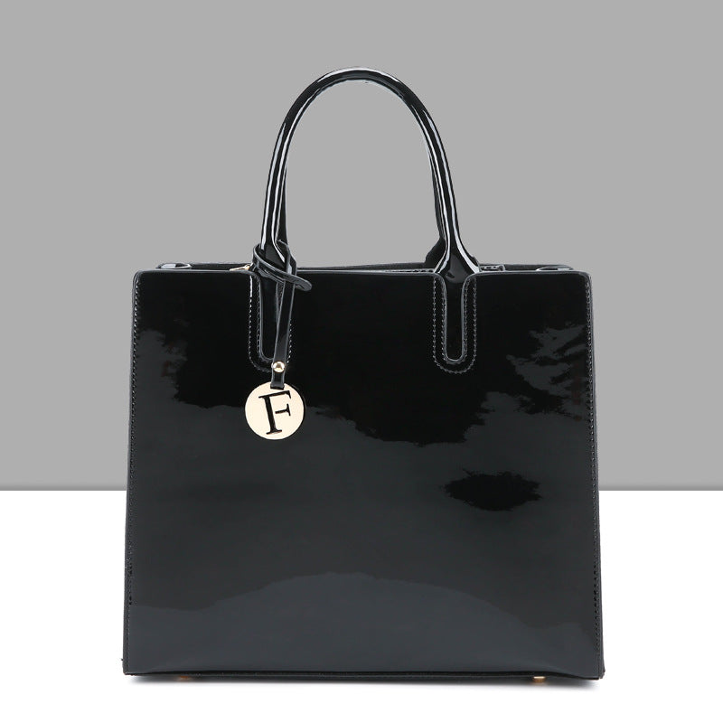 Artificial Patent Leather Glossy handbag Luvéillé