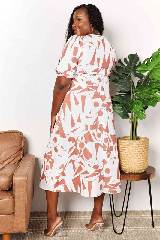 Double Take Printed Surplice Balloon Sleeve Dress Luvéillé