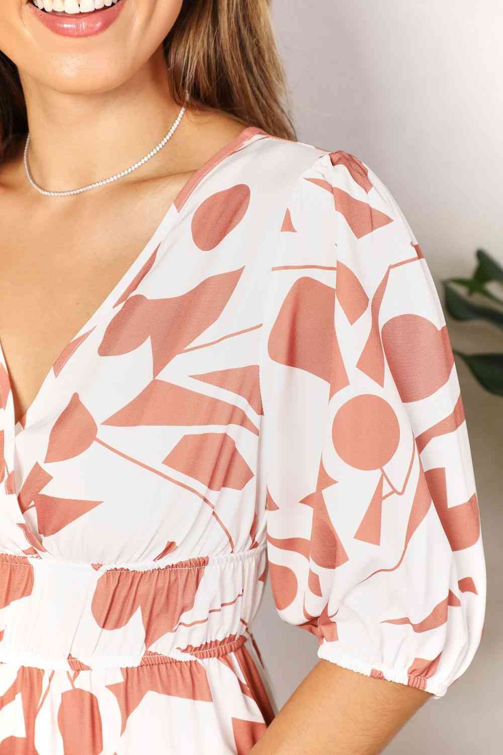 Double Take Printed Surplice Balloon Sleeve Dress Luvéillé