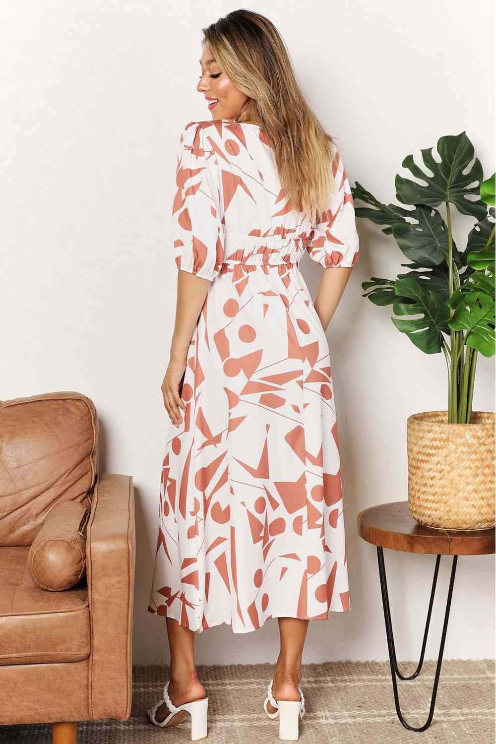 Double Take Printed Surplice Balloon Sleeve Dress Luvéillé