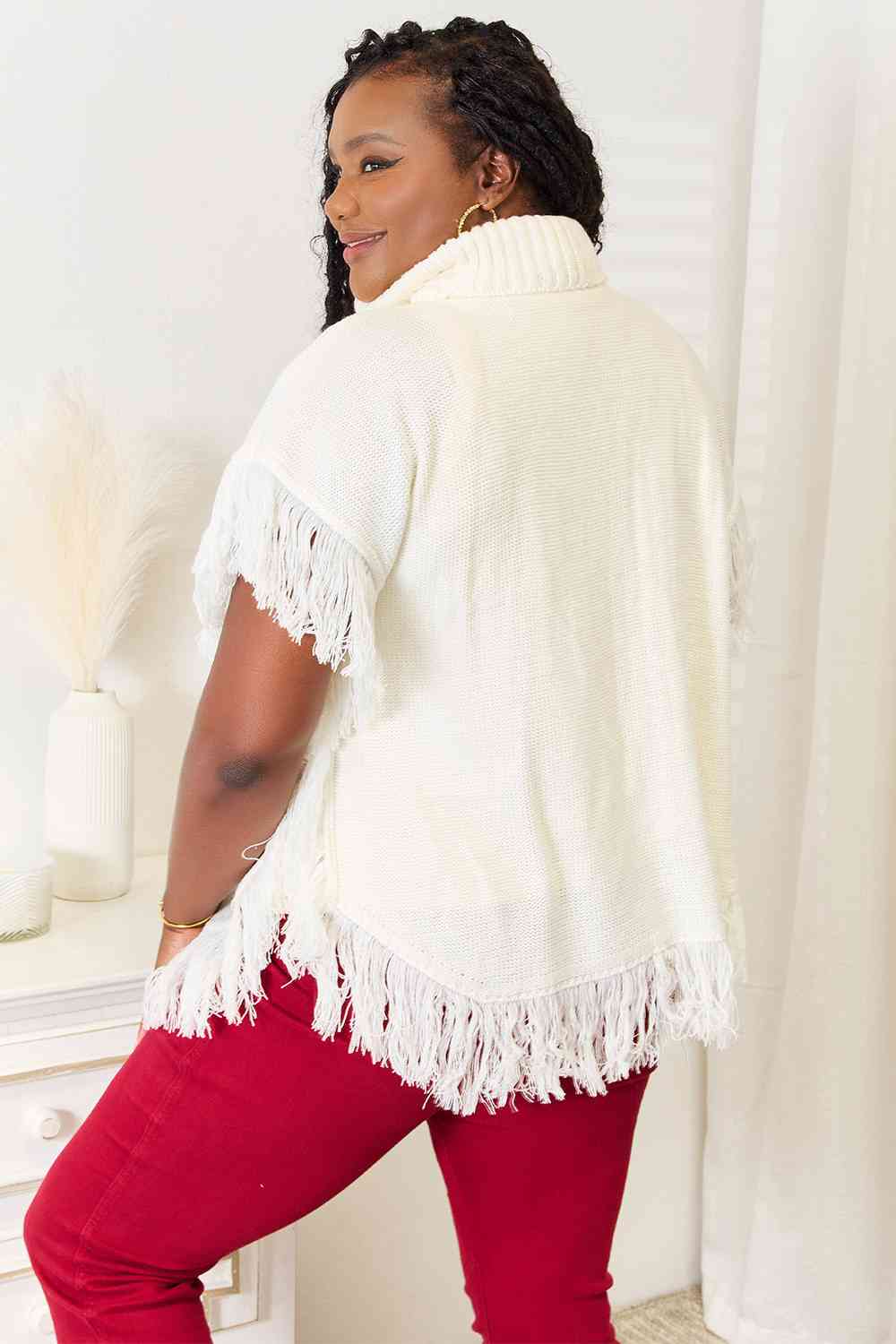 Justin Taylor Turtle Neck Fringe Poncho Luvéillé