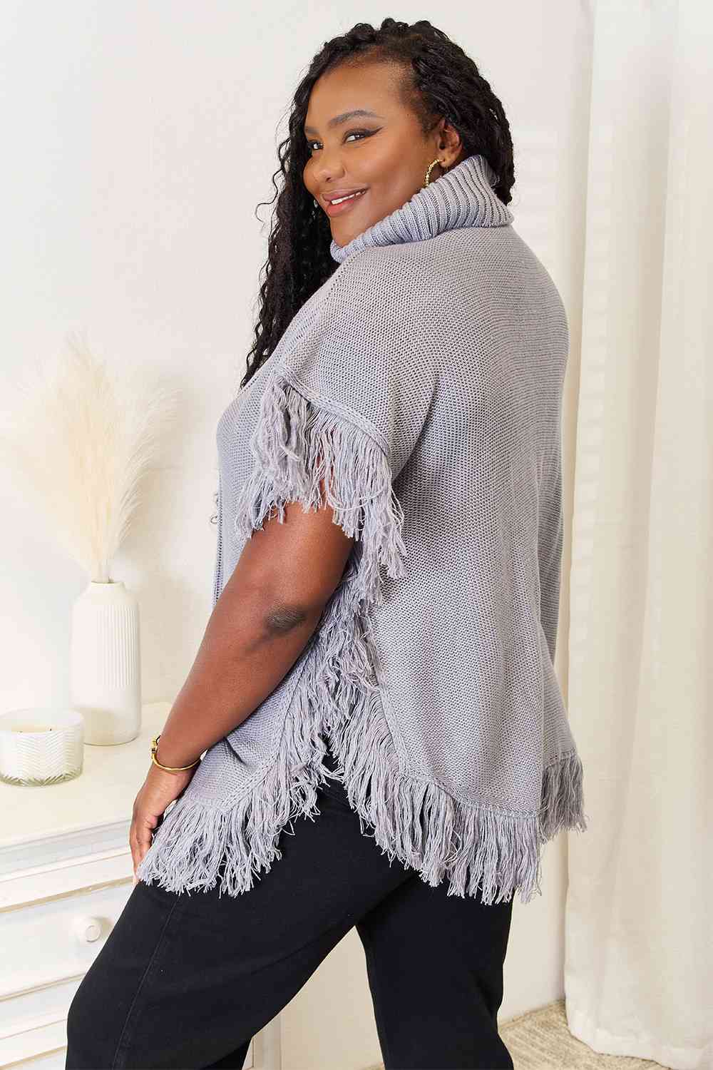 Justin Taylor Turtle Neck Fringe Poncho Luvéillé