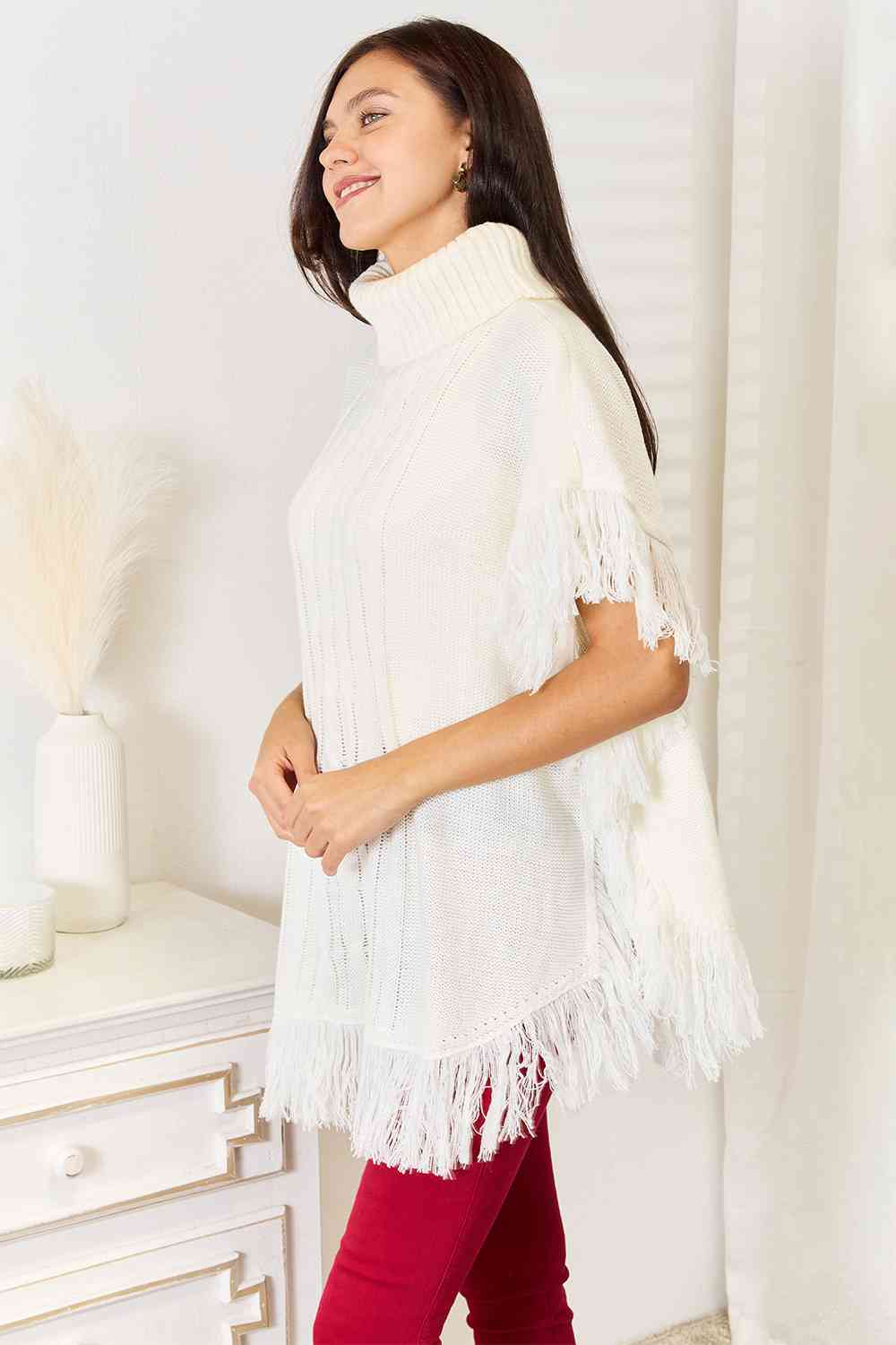 Justin Taylor Turtle Neck Fringe Poncho Luvéillé