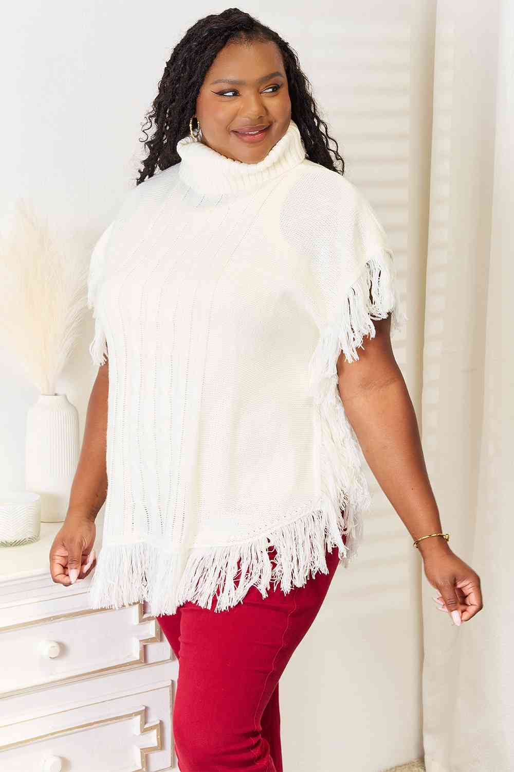 Justin Taylor Turtle Neck Fringe Poncho Luvéillé