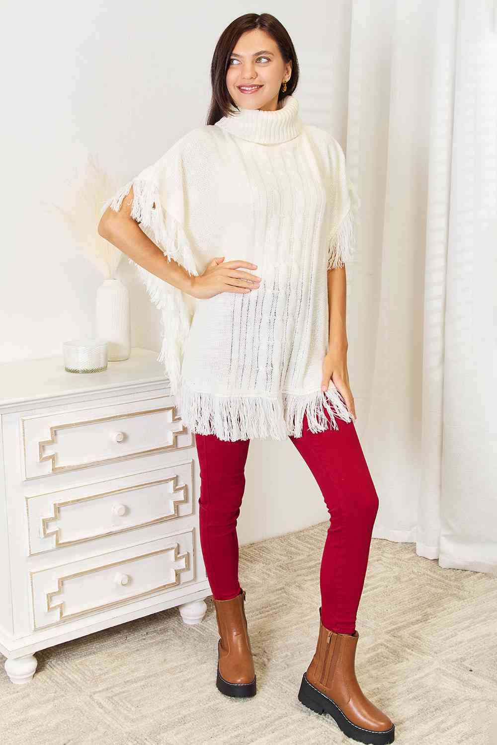 Justin Taylor Turtle Neck Fringe Poncho Luvéillé