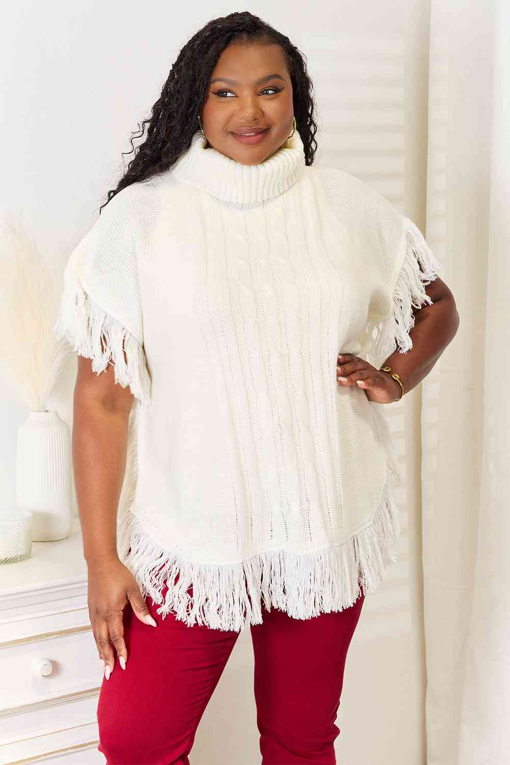 Justin Taylor Turtle Neck Fringe Poncho Luvéillé
