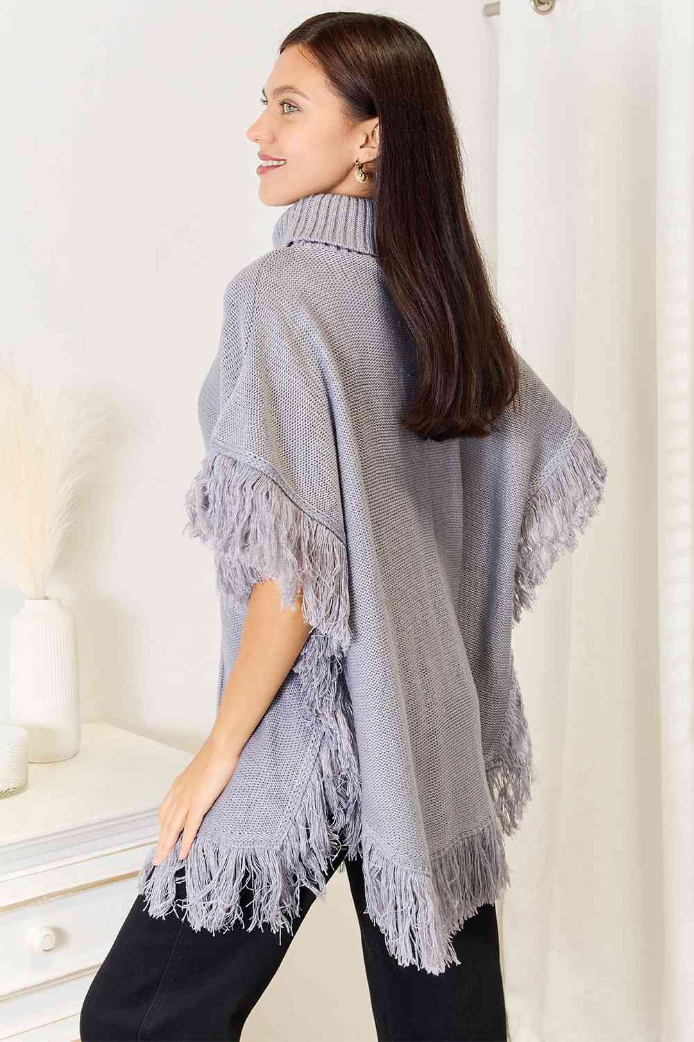 Justin Taylor Turtle Neck Fringe Poncho Luvéillé