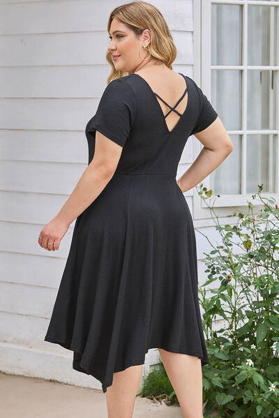 Plus Size Ruched Crisscross V-Neck Short Sleeve Dress Luvéillé