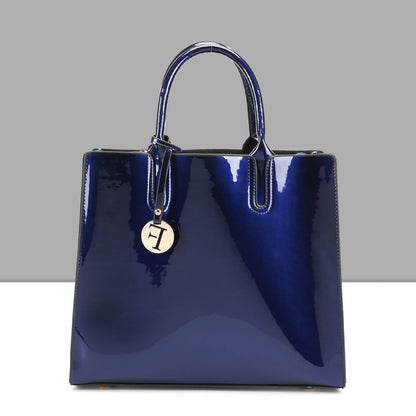 Artificial Patent Leather Glossy handbag Luvéillé