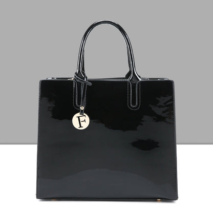Artificial Patent Leather Glossy handbag Luvéillé
