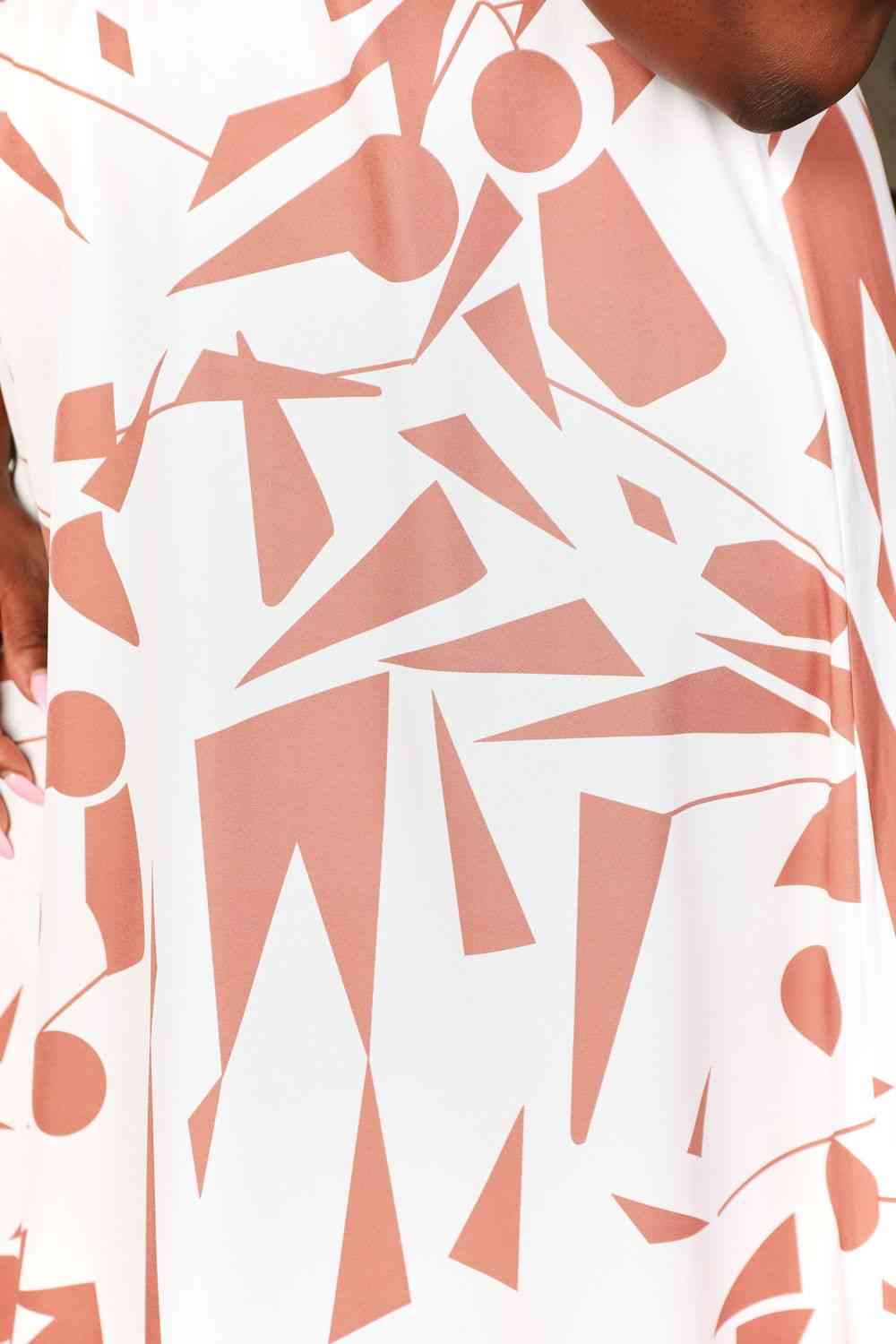 Double Take Printed Surplice Balloon Sleeve Dress Luvéillé