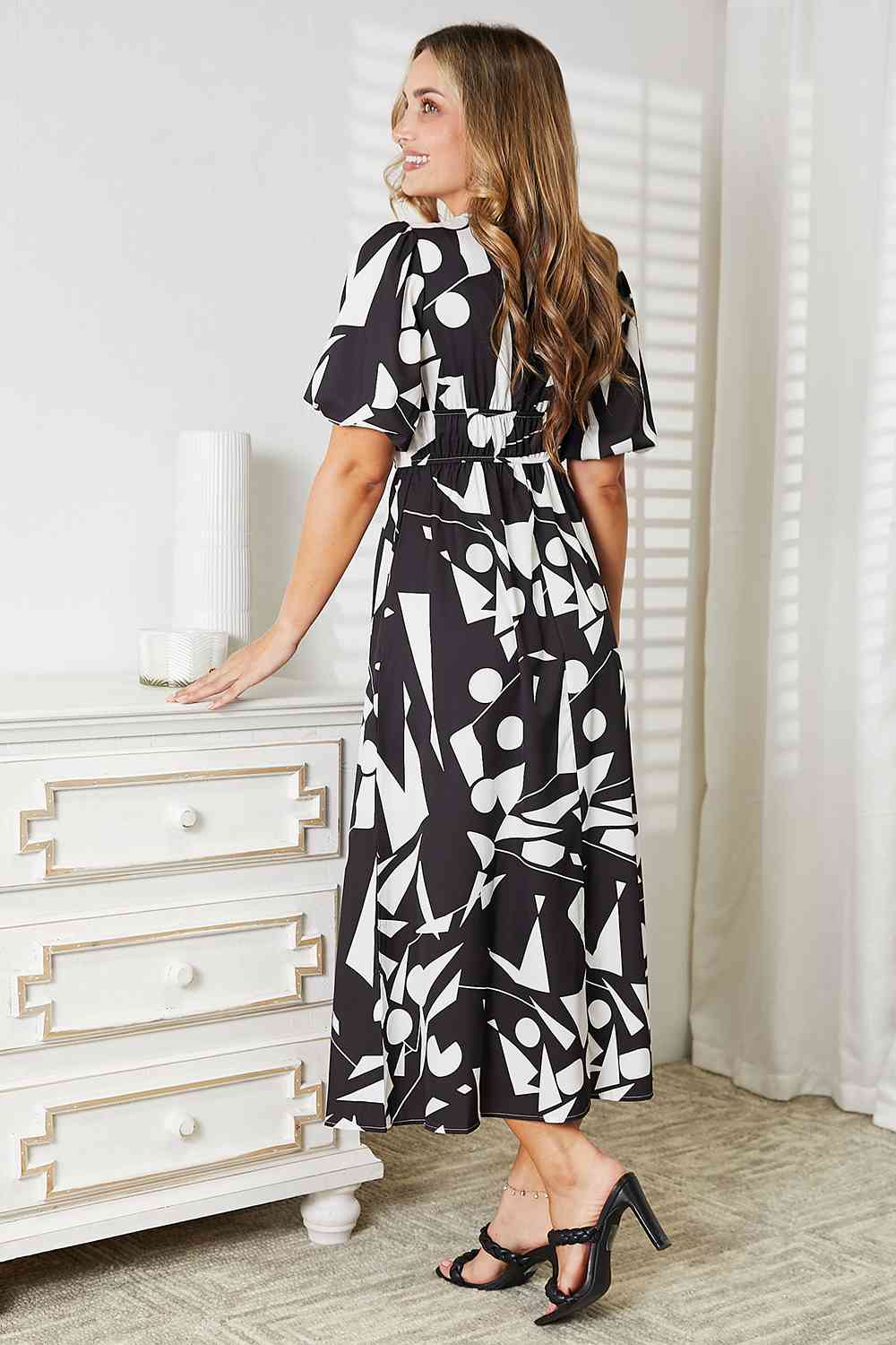 Double Take Printed Surplice Balloon Sleeve Dress Luvéillé