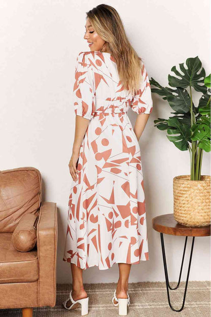 Double Take Printed Surplice Balloon Sleeve Dress Luvéillé