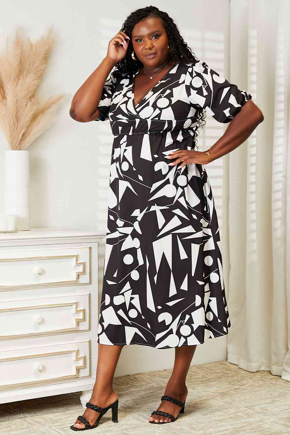 Double Take Printed Surplice Balloon Sleeve Dress Luvéillé
