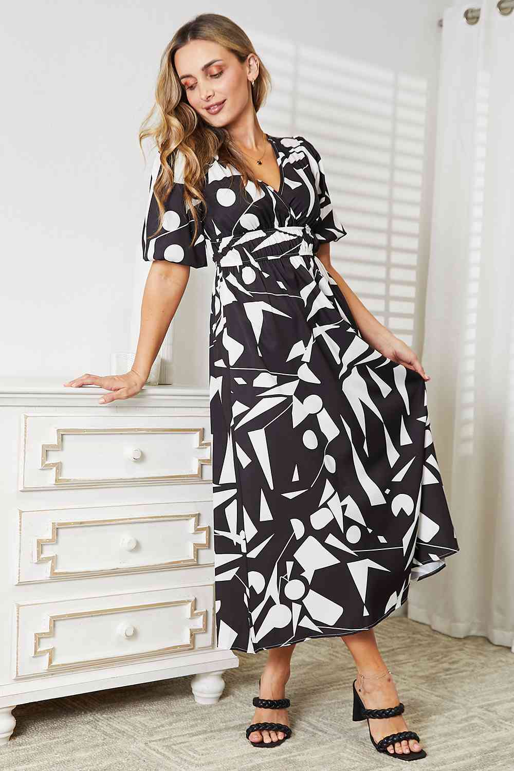 Double Take Printed Surplice Balloon Sleeve Dress Luvéillé