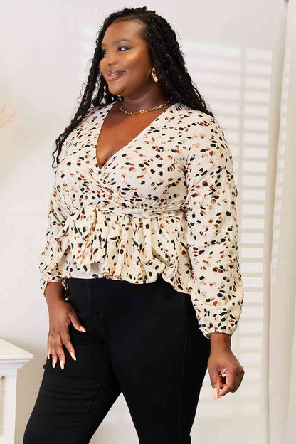 Double Take Printed Tied Plunge Peplum Blouse Luvéillé
