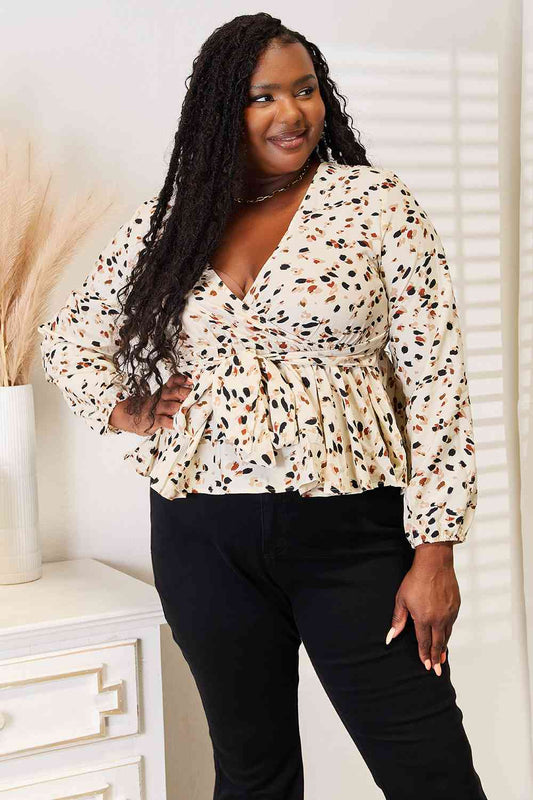 Double Take Printed Tied Plunge Peplum Blouse Luvéillé