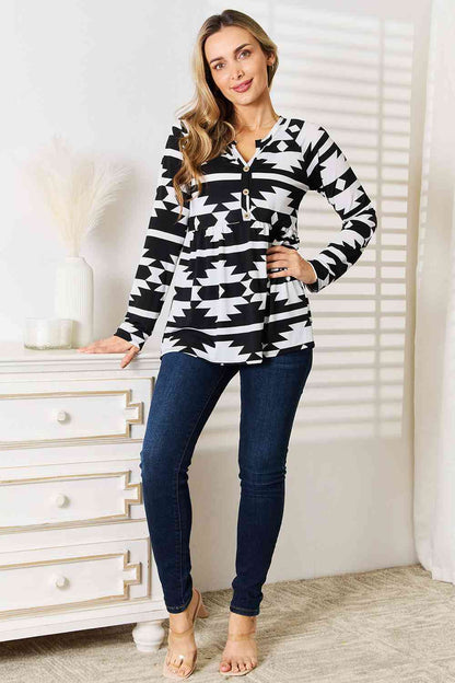 Heimish Full Size Geometric Notched Neck Long Sleeve Top Luvéillé