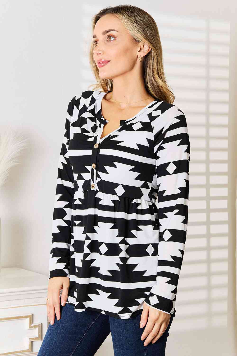 Heimish Full Size Geometric Notched Neck Long Sleeve Top Luvéillé