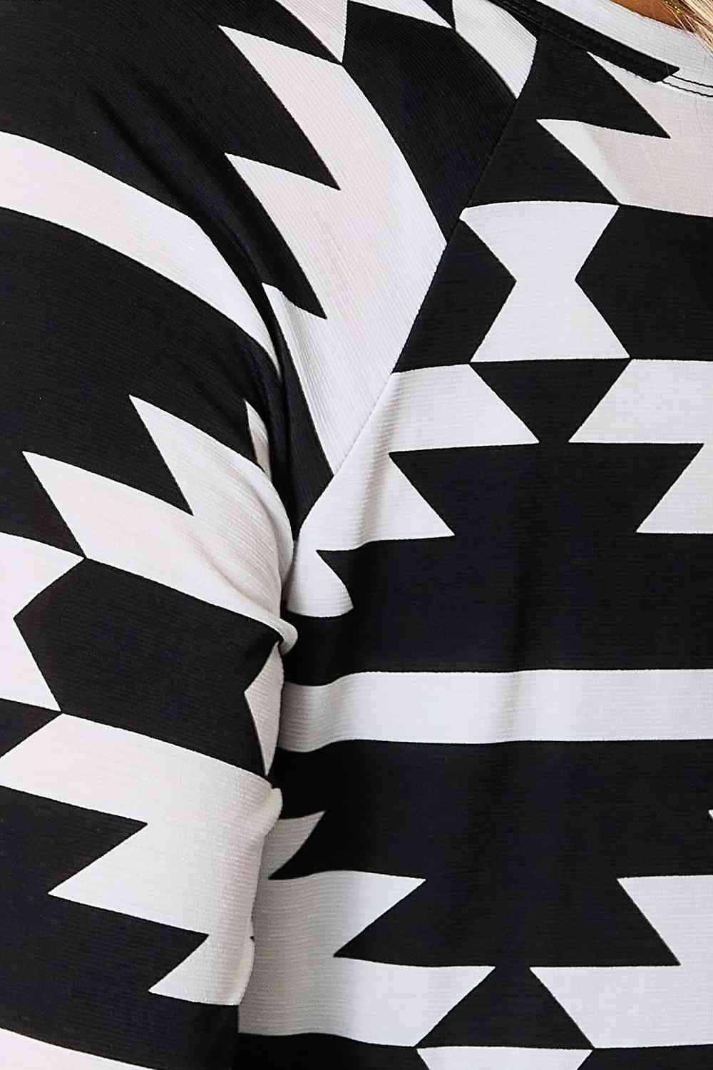 Heimish Full Size Geometric Notched Neck Long Sleeve Top Luvéillé