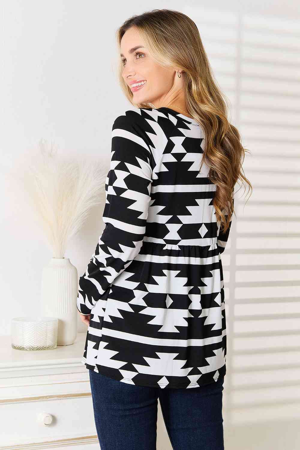 Heimish Full Size Geometric Notched Neck Long Sleeve Top Luvéillé
