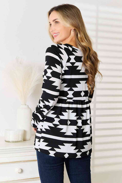 Heimish Full Size Geometric Notched Neck Long Sleeve Top Luvéillé