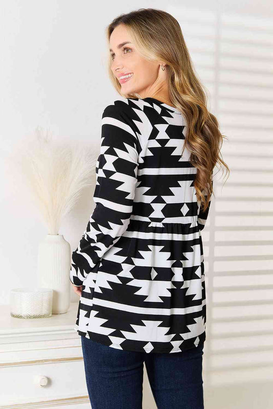 Heimish Full Size Geometric Notched Neck Long Sleeve Top Luvéillé