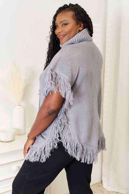 Justin Taylor Turtle Neck Fringe Poncho Luvéillé