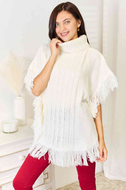 Justin Taylor Turtle Neck Fringe Poncho Luvéillé