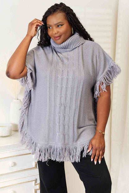 Justin Taylor Turtle Neck Fringe Poncho Luvéillé
