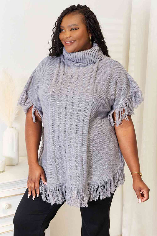 Justin Taylor Turtle Neck Fringe Poncho Luvéillé