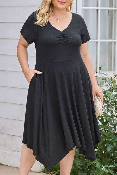 Plus Size Ruched Crisscross V-Neck Short Sleeve Dress Luvéillé